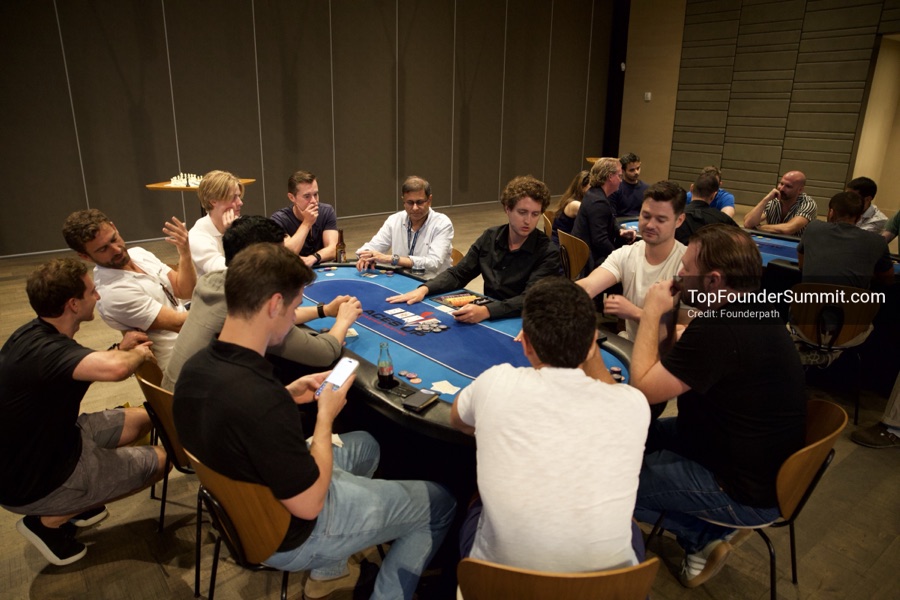 Founders playing poker, Catan and chess at Games Night, Top Founders Summit Napa 2026