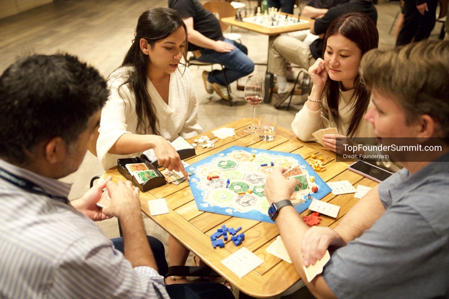 Founders playing poker, Catan and chess at Games Night, Top Founders Summit Napa 2026