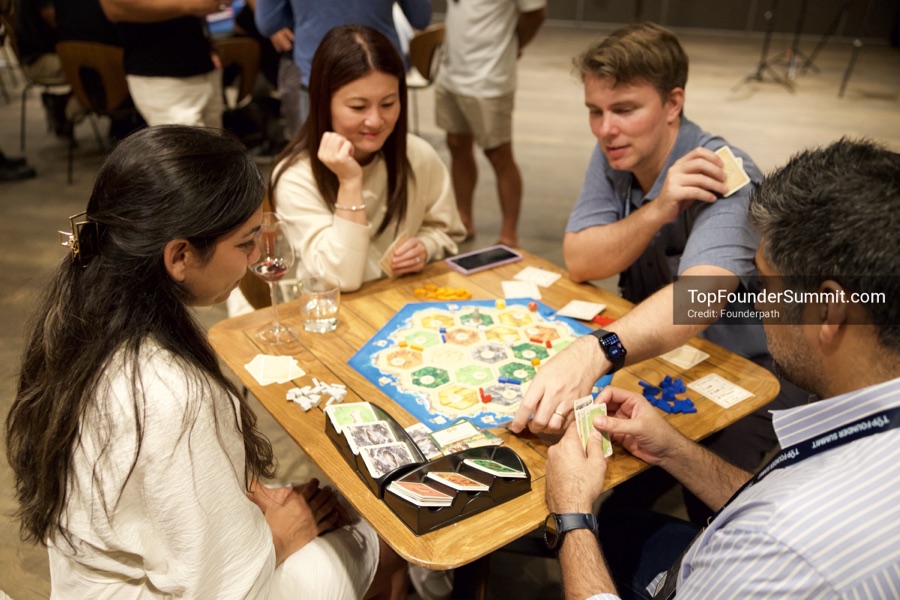 Founders playing poker, Catan and chess at Games Night, Top Founders Summit Napa 2026