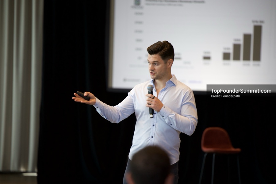 Founders on the main stage and in the audience during the opening keynotes at Glass House, Top Founders Summit Napa 2026