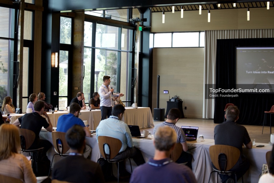 Founders on the main stage and in the audience during the opening keynotes at Glass House, Top Founders Summit Napa 2026