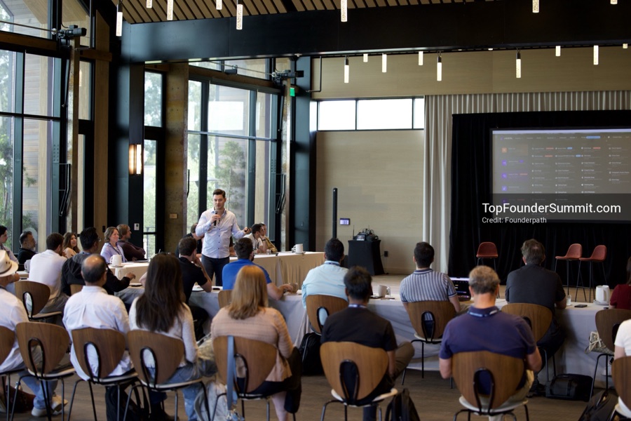 Founders on the main stage and in the audience during the opening keynotes at Glass House, Top Founders Summit Napa 2026