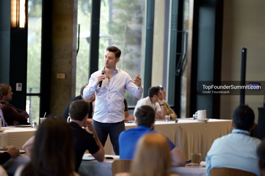 Founders on the main stage and in the audience during the opening keynotes at Glass House, Top Founders Summit Napa 2026