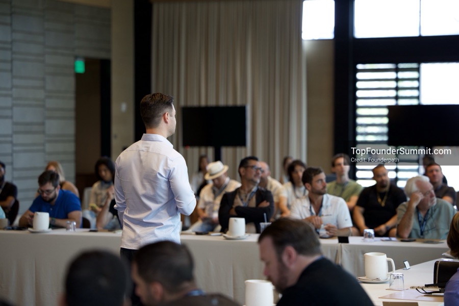 Founders on the main stage and in the audience during the opening keynotes at Glass House, Top Founders Summit Napa 2026
