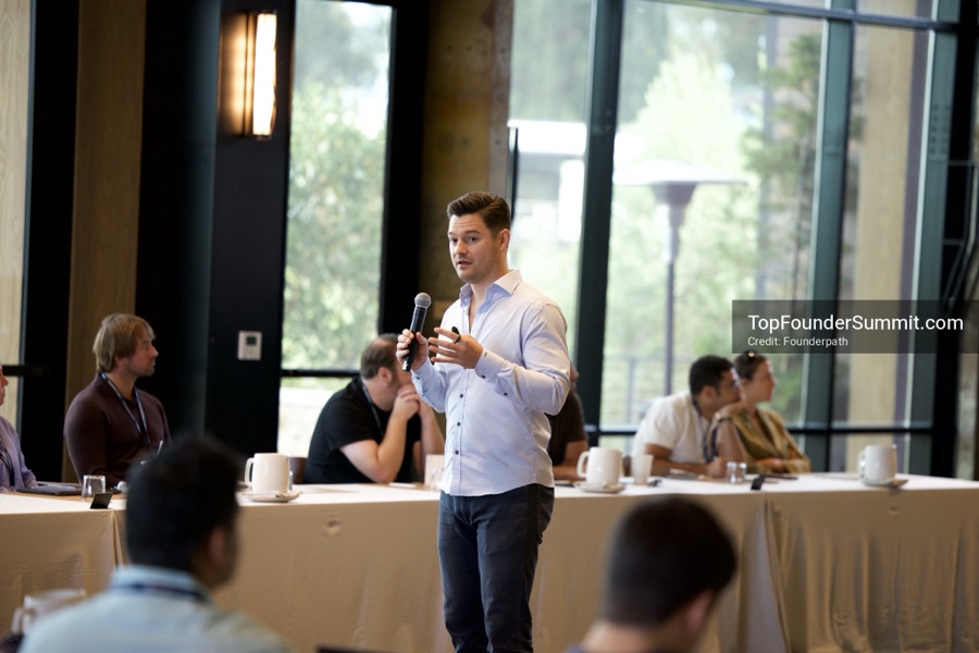 Founders on the main stage and in the audience during the opening keynotes at Glass House, Top Founders Summit Napa 2026
