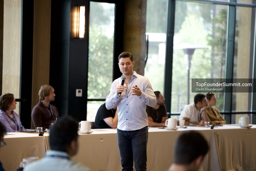 Founders on the main stage and in the audience during the opening keynotes at Glass House, Top Founders Summit Napa 2026