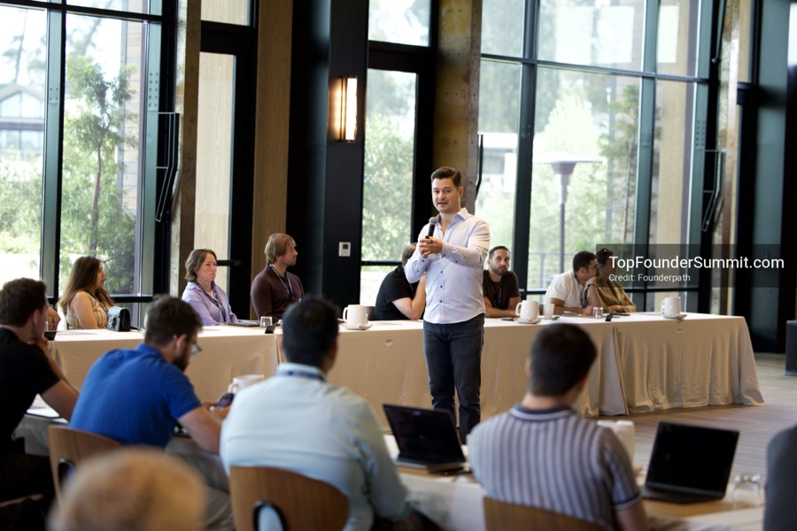 Founders on the main stage and in the audience during the opening keynotes at Glass House, Top Founders Summit Napa 2026