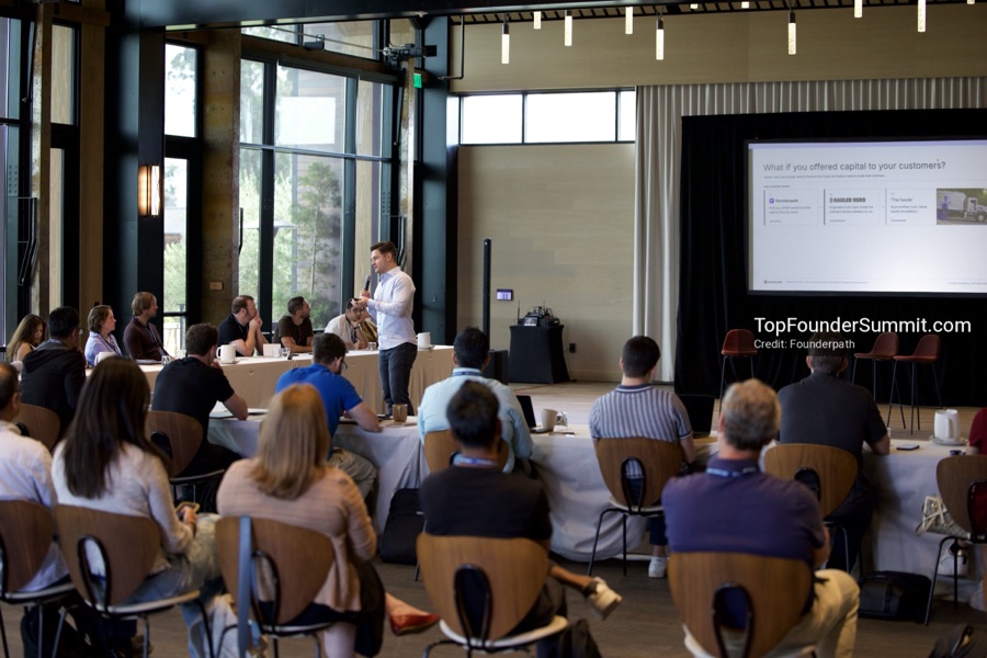 Founders on the main stage and in the audience during the opening keynotes at Glass House, Top Founders Summit Napa 2026