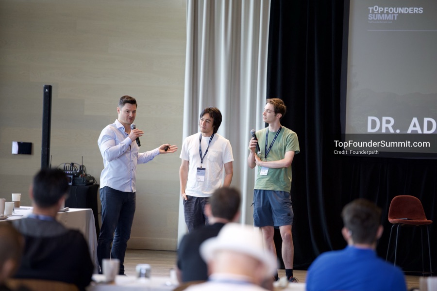 Founders on the main stage and in the audience during the opening keynotes at Glass House, Top Founders Summit Napa 2026