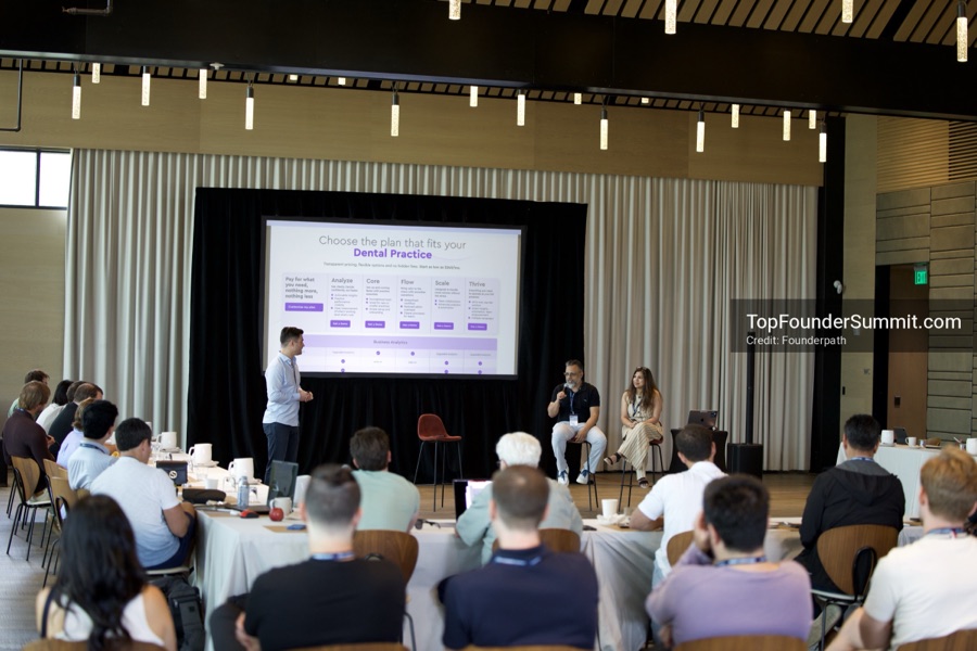 Founders on the main stage and in the audience during the opening keynotes at Glass House, Top Founders Summit Napa 2026