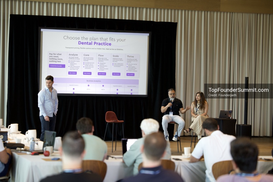 Founders on the main stage and in the audience during the opening keynotes at Glass House, Top Founders Summit Napa 2026