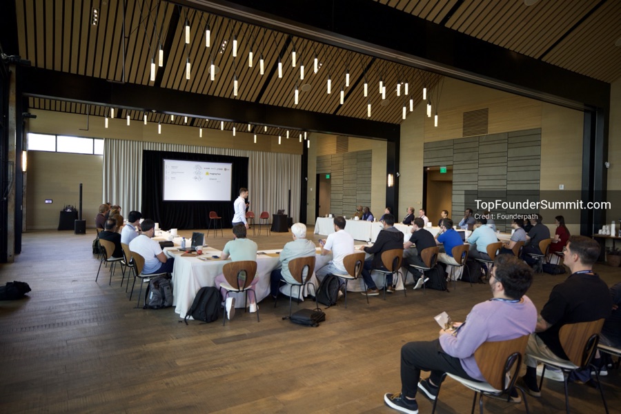 Founders on the main stage and in the audience during the opening keynotes at Glass House, Top Founders Summit Napa 2026