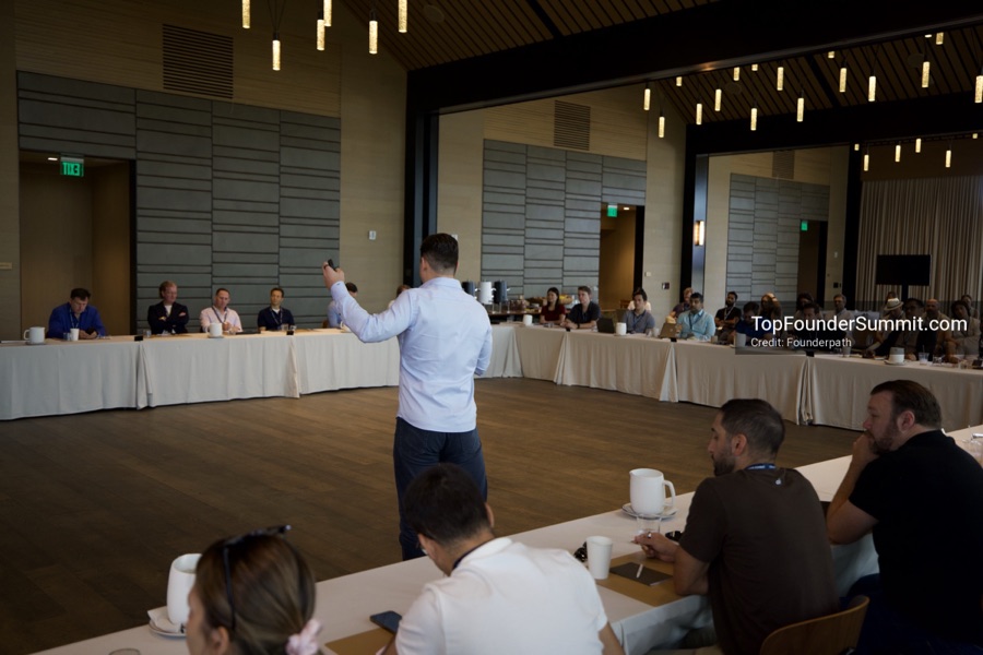 Founders on the main stage and in the audience during the opening keynotes at Glass House, Top Founders Summit Napa 2026